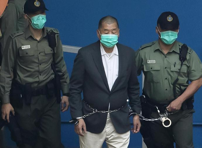 Jimmy Lai condotto in tribunale