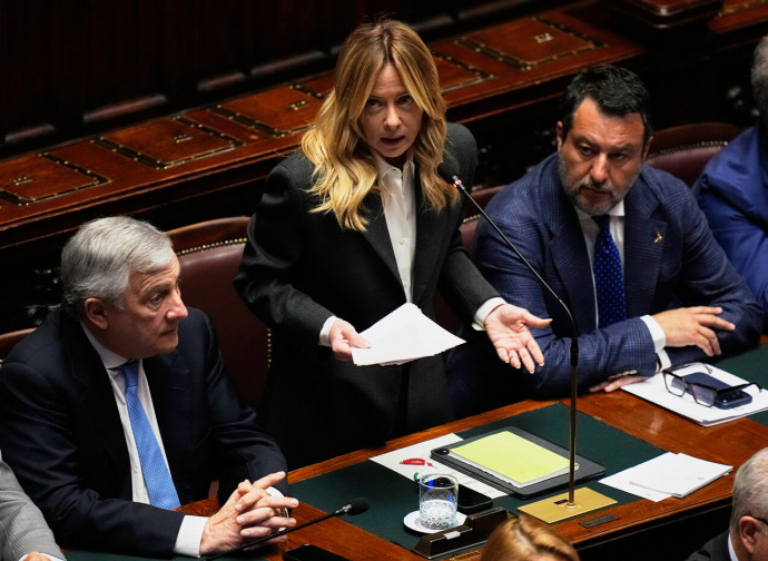 Giorgia Meloni con i vicepremier Tajani e Salvini (La Presse)