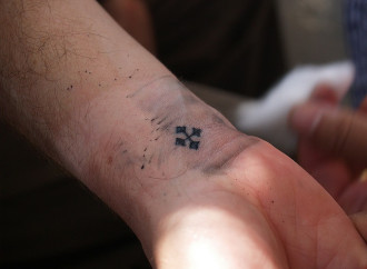 Ucciso dai membri dell'Isis per il tatuaggio a croce
