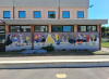 Il murale dei ragazzi dell'Oratorio che prende la fede in burla